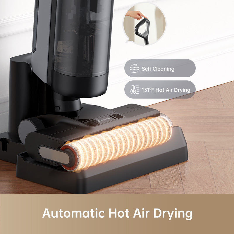 Dreame H12 vacuum displaying automatic hot air drying feature on hardwood floor.