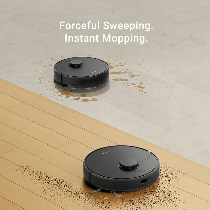 Dreame D9 Max Gen 2 vacuum efficiently sweeping and mopping dirt on floor.